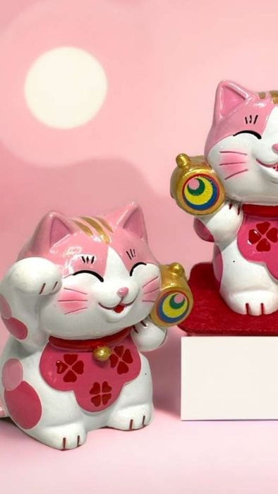 Hình nền mèo thần tài với màu hồng ngọt ngào