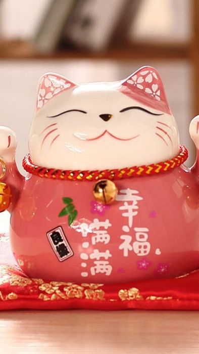 Mèo thần tài nền hồng xinh xắn và đáng yêu