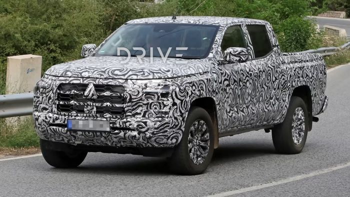 Mitsubishi Pajero Sport phiên bản mới sẽ sớm ra mắt: Dài, rộng và táo bạo hơn - Ảnh 2.