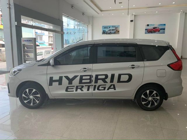 Xe Suzuki Ertiga hybrid đầu tiên về đại lý: Giá dự kiến gần 700 triệu đồng, đã có xe chạy thử - Ảnh 5.