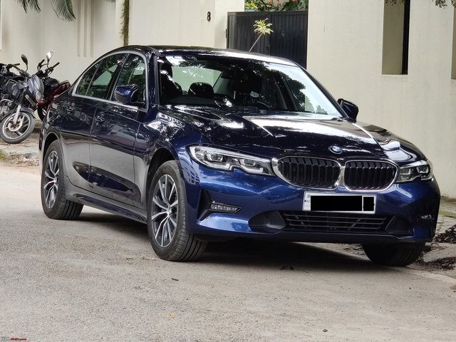 Việc lái BMW 330i Sport mạnh mẽ nhưng gặp khó khăn khi ra vào - Hình 10.