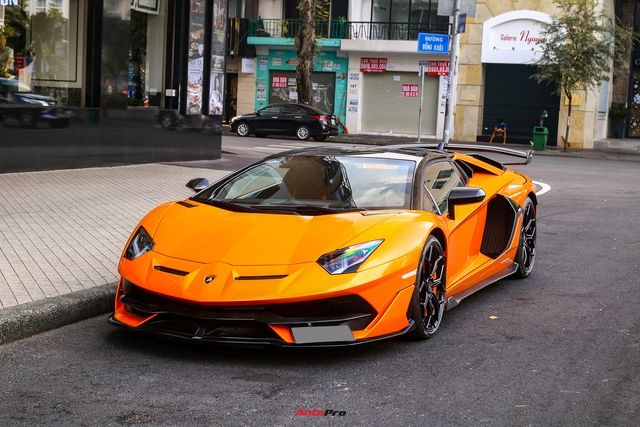 Khám phá Lamborghini Aventador SVJ Roadster màu cam vừa về Việt Nam - Ảnh 1.