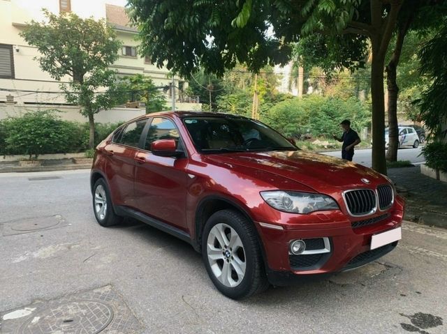 BMW X6 'sống sót' sau gần 120.000km, giá bán thấp hơn cả Hyundai Kona - Ảnh 1.