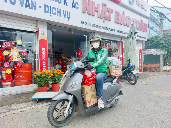 Từ việc thất nghiệp sang làm Grab, tài xế chia sẻ: ‘Chạy shipper bằng xe máy điện thì cực kỳ hợp lý’ - Ảnh 5.