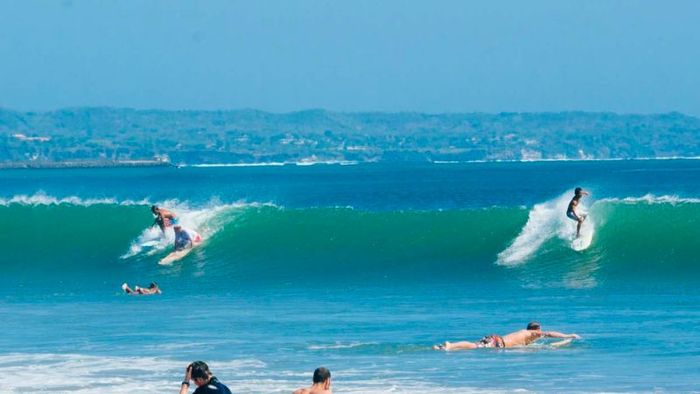 Từ một làng chài hoang vắng, Kuta đã trở thành thiên đường du lịch tại Bali