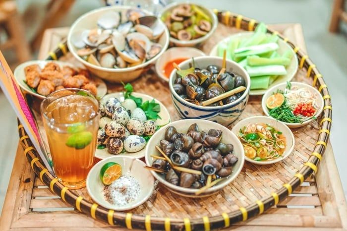 Kinh nghiệm du lịch Sài Gòn 4 ngày 3 đêm không thể không trải qua ốc Sài Gòn, một trải nghiệm thú vị và đầy hấp dẫn. Ảnh: Zing