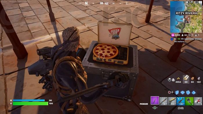 Phá hủy một trong những đĩa pizza điều khiển não bộ ác trong Fortnite