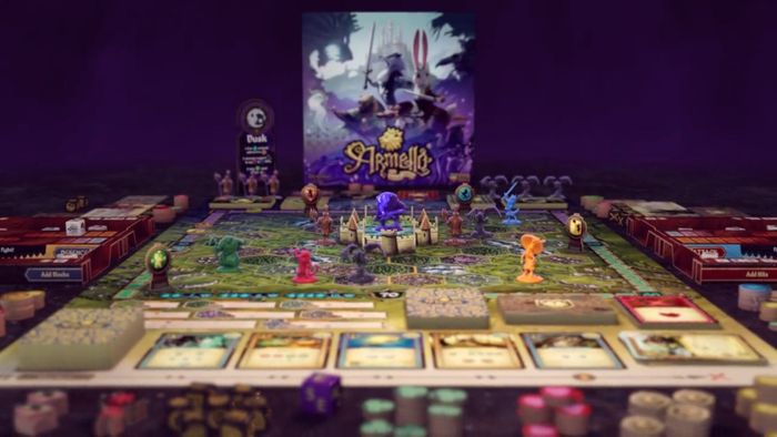 Hộp trò chơi Armello: The Board Game, bảng, miniatures, các token và thẻ được bày ra trong một trò chơi