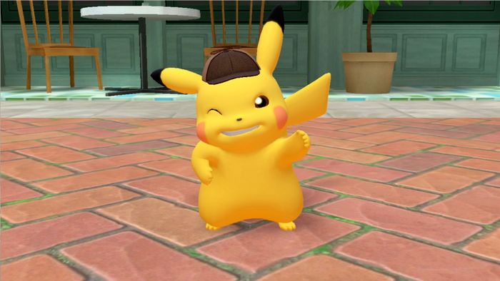 Thám tử Pikachu cười và nâng ngón tay cái lên