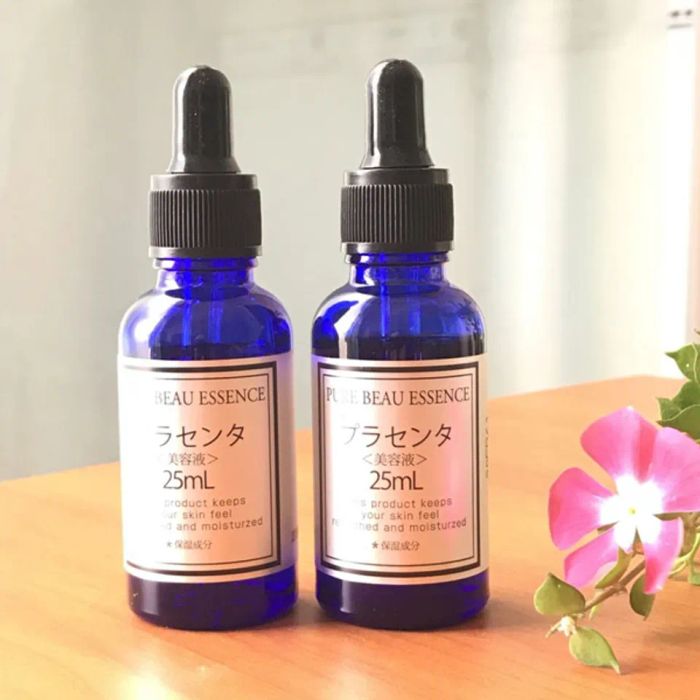 Serum nhau thai cừu Nhật màu tím Pure Beau Essence Placenta giúp xóa nám, tàn nhang