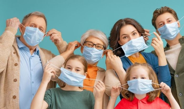 Phòng tránh virus bằng cách đeo khẩu trang để ngăn chặn giọt bắn chứa virus