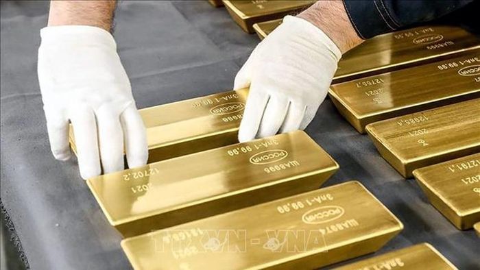 Giá vàng thế giới đến cuối tháng 7 đã tăng mạnh lên trên mức 1.450 USD/oz - Ảnh minh họa: KT