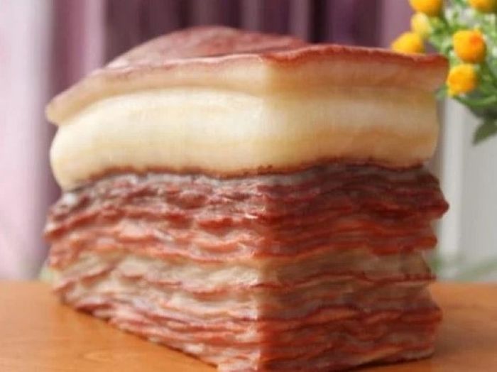 Quyết định bán nhà để mua viên đá có hình dạng như miếng thịt ba chỉ, không ngờ giá trị của nó lại cao đến thế...