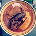 Fufu ở Ghana kèm theo xúp, thịt dê và cá hun khói
