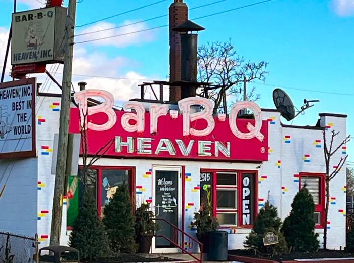 The exterior of the restaurant with a prominent Bar-B-Q Heaven sign.