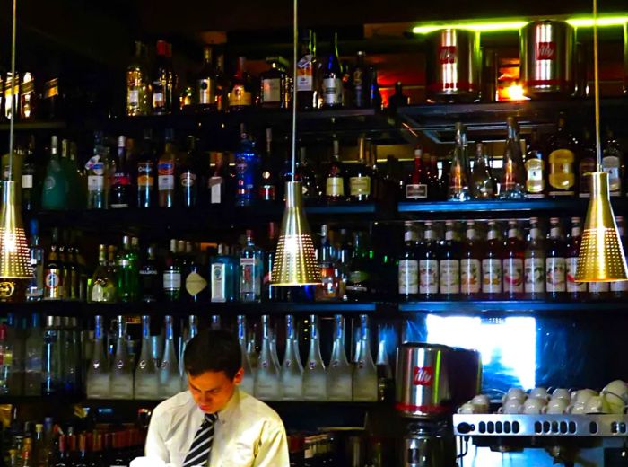 Behind the bar at Pravda, a popular Bogotá venue