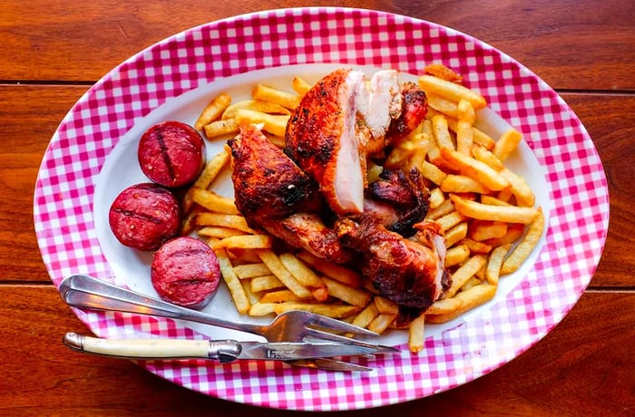 <span>Grilled chicken with summer sausage and fries</span>