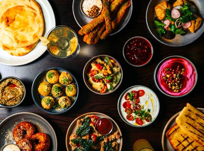 A selection of diverse dishes arrayed on a table.