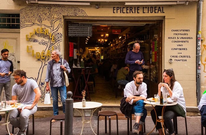 Outdoor tables at L’Epicerie Ideal