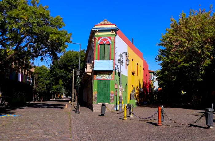 A vibrant storefront stands empty