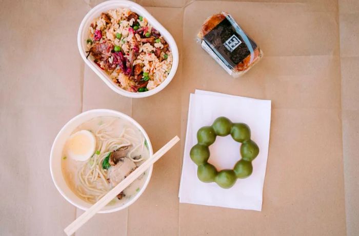 Four dishes including char siu fried rice, deluxe Spam musubi, matcha mochi donut, and pork tonkatsu ramen.