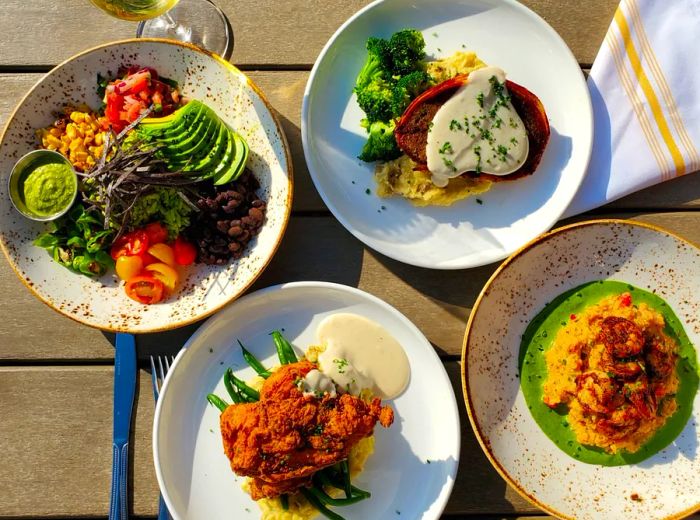 A table filled with a variety of lunch plates