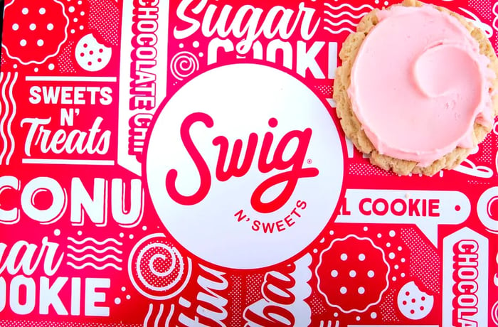 A box featuring the Swig logo alongside a cookie.