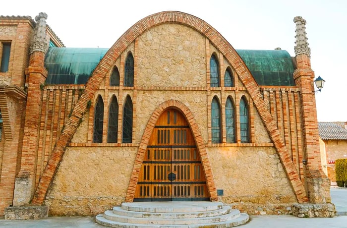 A brick building with a dome.