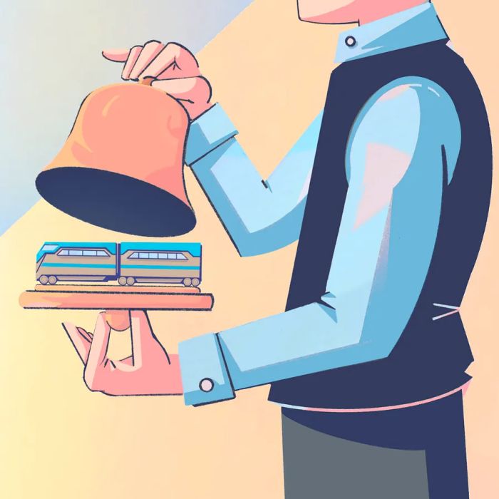 An illustration depicts a waiter lifting the lid off a cloche to reveal a tiny train.