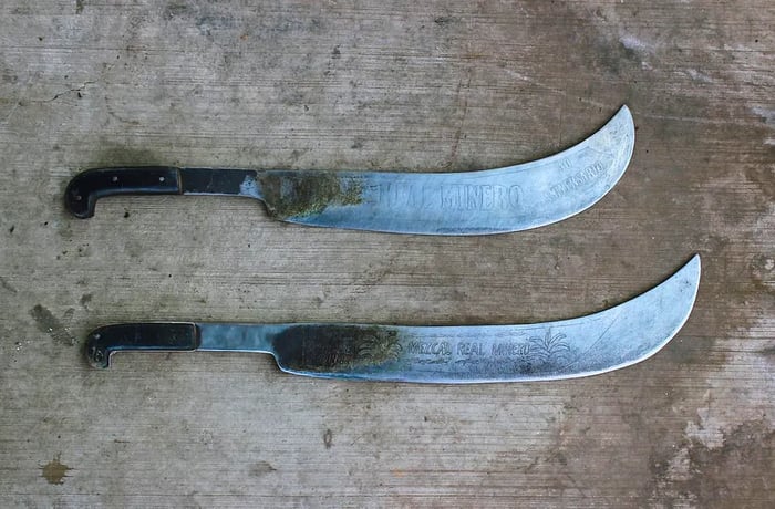 Two large machetes.