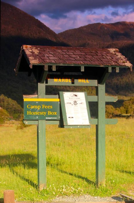 Honesty box at a campsite for travelers to pay their fees in New Zealand.