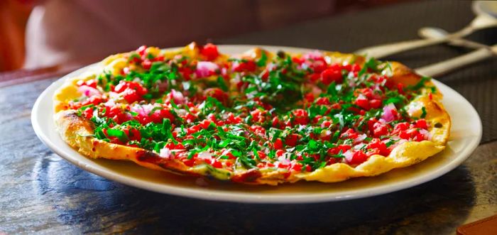 The mouthwatering steak tartare pizza at Snake River Grill