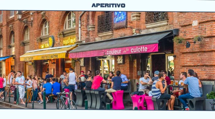 Bustling outdoor bar terraces filled with patrons in Toulouse