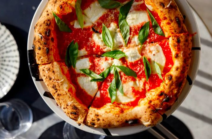 An aerial view of a margherita pizza.