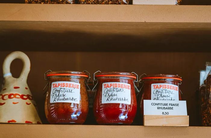 Jars of jam with labels in French.