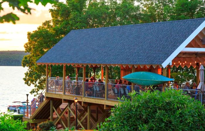 A covered dock where guests can dine under twinkling string lights.