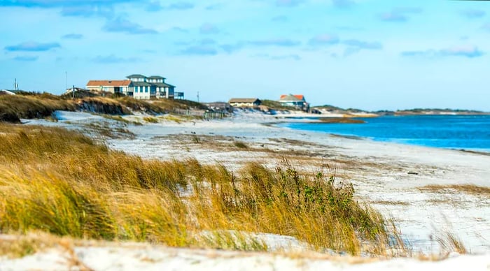 Coastal houses dot the sandy shores of North Carolina's Outer Banks.