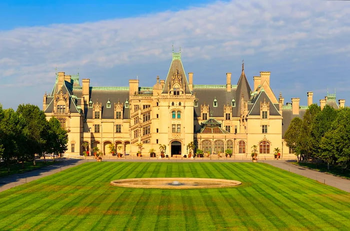 The stunning facade of the Biltmore Estate along with its expansive grounds in Asheville