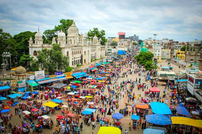 The streets around Charminar are bustling with shoppers every day.