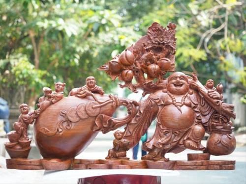 Tượng Di Lặc kéo bao tiền
