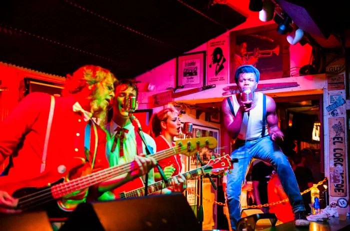 A band playing in rockabilly attire at the Green Parrot bar in Key West, Florida.