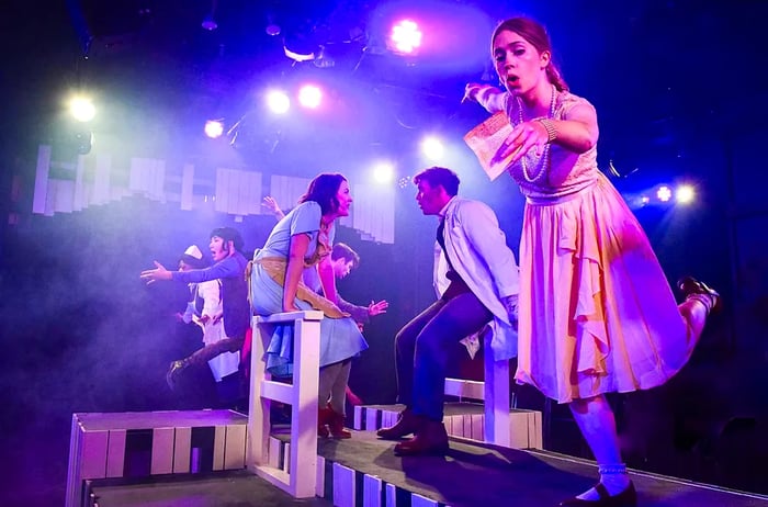 Actors performing in the musical Alice by Heart at Chopin Theatre.