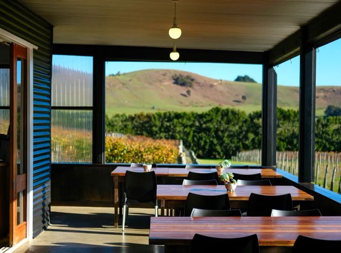 A dining area with views of rolling hills.