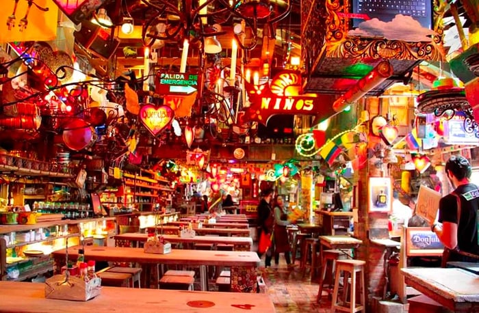 Inside a whimsically decorated bar.