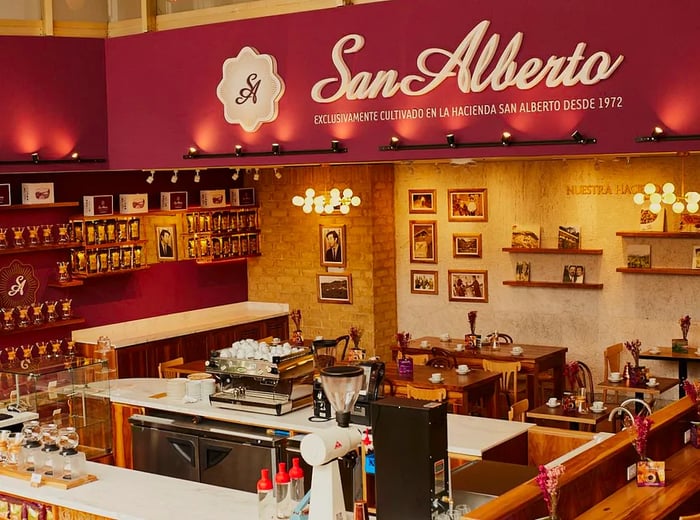 A café counter brimming with an array of coffee products on display.