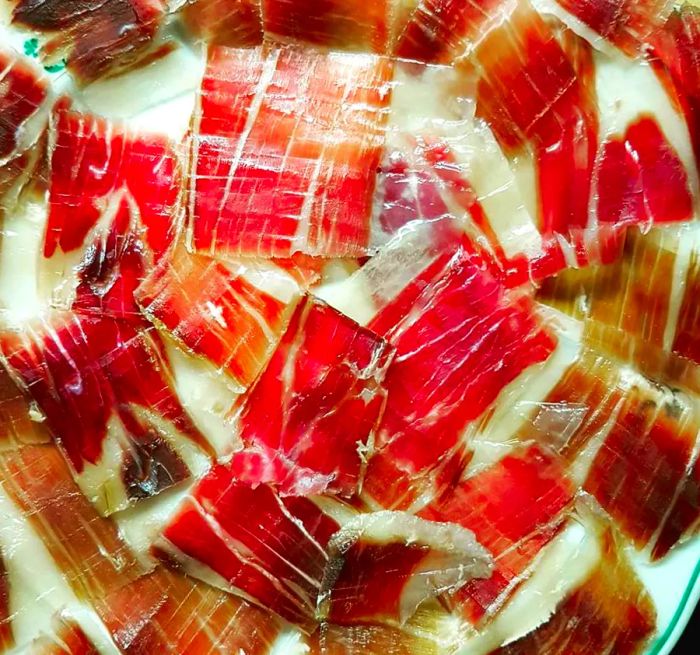 Aerial view showcasing delicate swirls of Iberico ham.