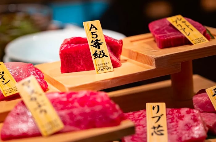 Thick slices of rich red wagyu beef.