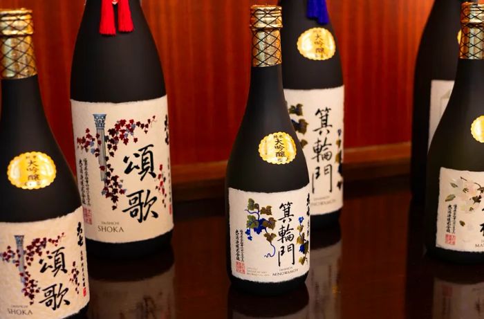 An assortment of sake bottles.