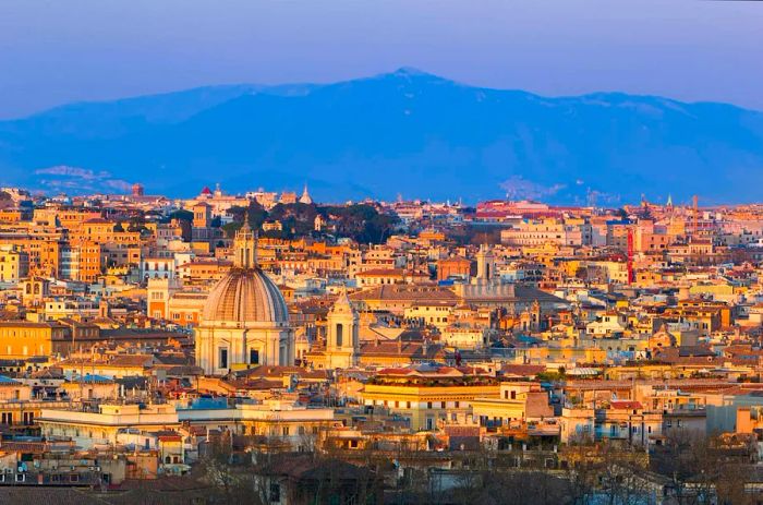 A breathtaking view of Rome at sunset from the Gianicolo (Janiculum) hill.