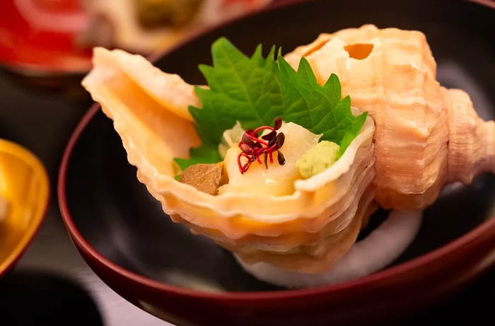 Seafood elegantly displayed within its shell.